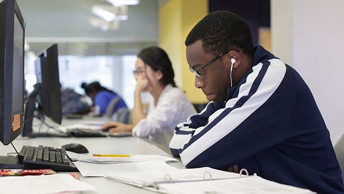 Student studying in Meyer Library.